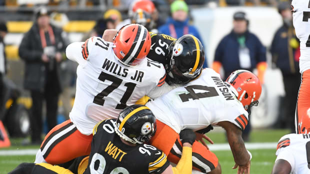 Jan 8, 2023; Pittsburgh, Pennsylvania, USA; Cleveland Browns quarterback Deshaun Watson (4) is pressured by Pittsburgh Steelers linebackers T.J. Watt (90) and Alex Highsmith (56) during the fourth quarter at Acrisure Stadium. Mandatory Credit: Philip G. Pavely-USA TODAY Sports